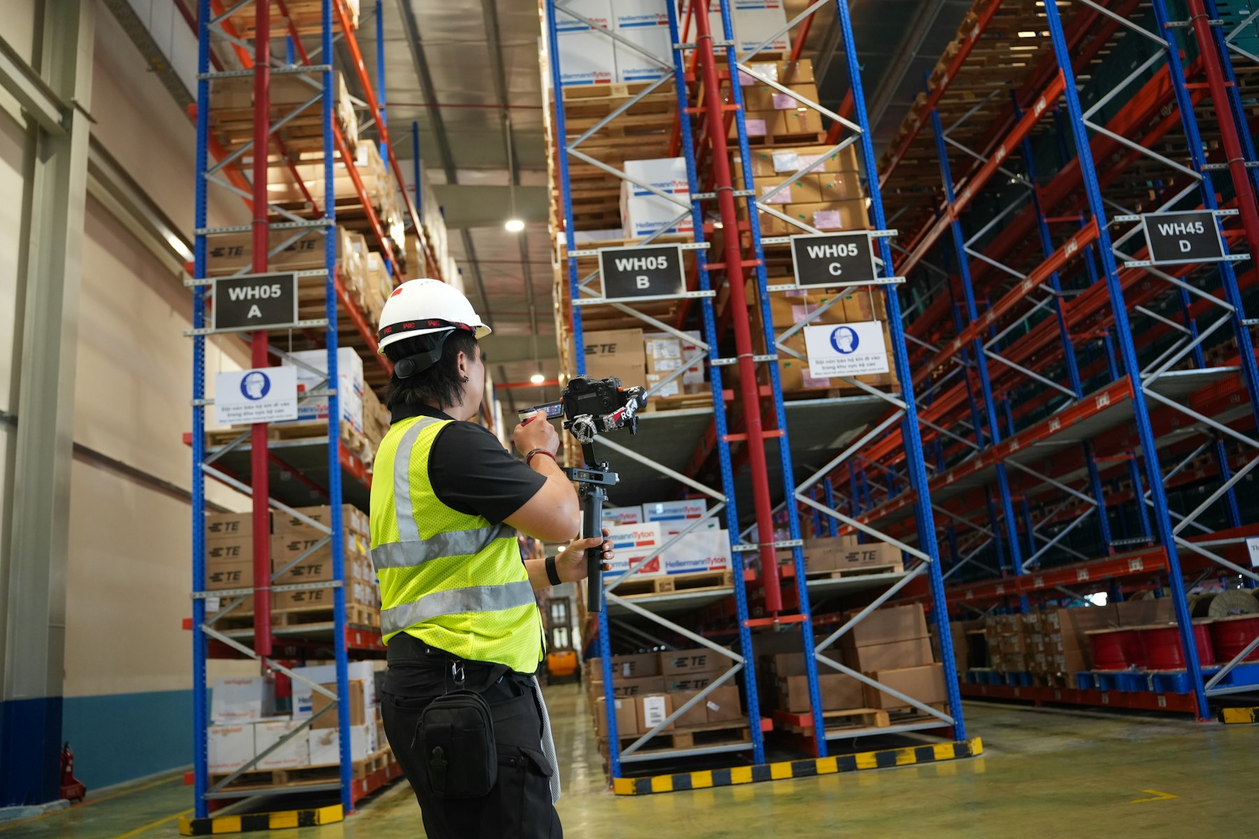 Warehouse aisle representing distributor operations and inventory-driven buying